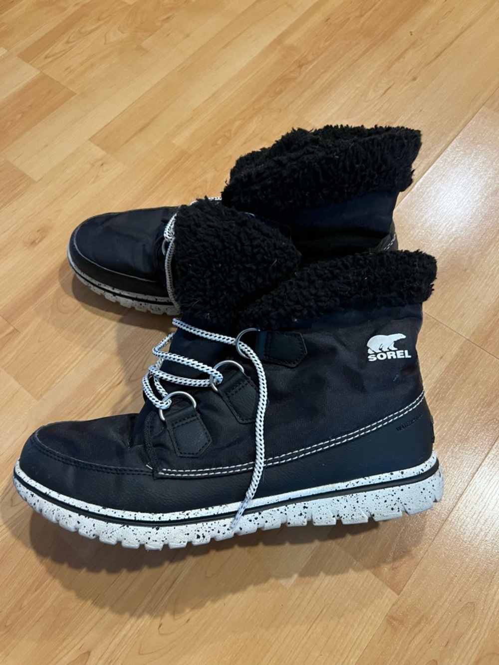 Sorel Black and White Faux-Shearling Lace-Up Boots